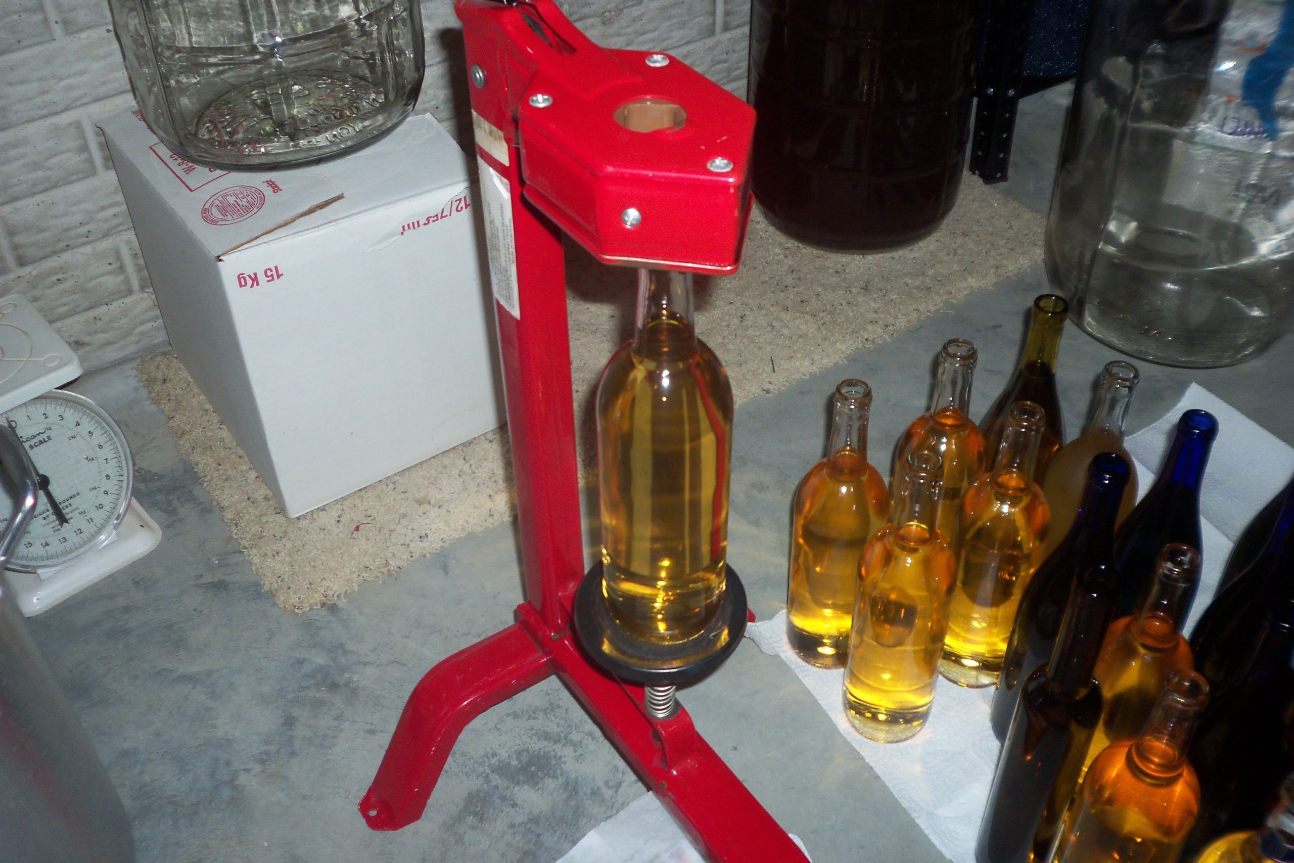 Bottling and Corking a honey wine a few years back. I need ...
