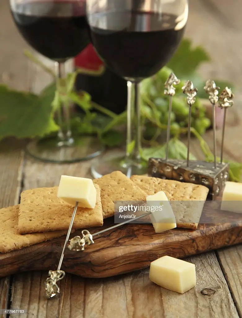 Cheese And Crackers With Glasses Of Red Wine High