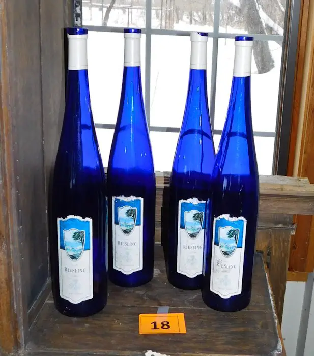 Cobalt blue tall wine bottles
