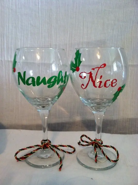 Items similar to Naughty and nice wine glass set ...